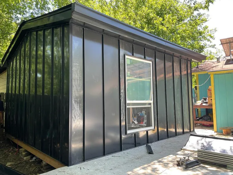 Black standing seam metal wall panels for Metal Roof Installation in Cudahy