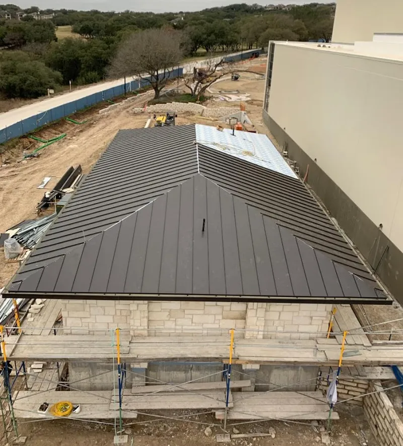 Metal roof new construction with scaffolding in Cudahy